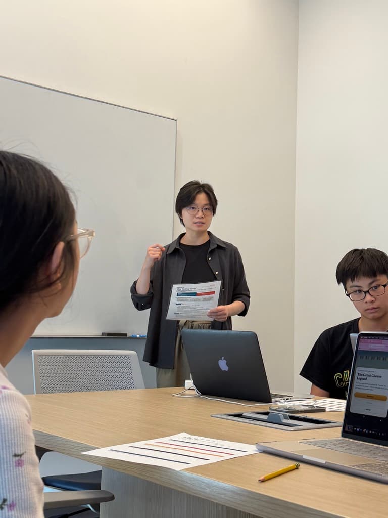 Instructor walking the group through the Vibe Coding Camp handout